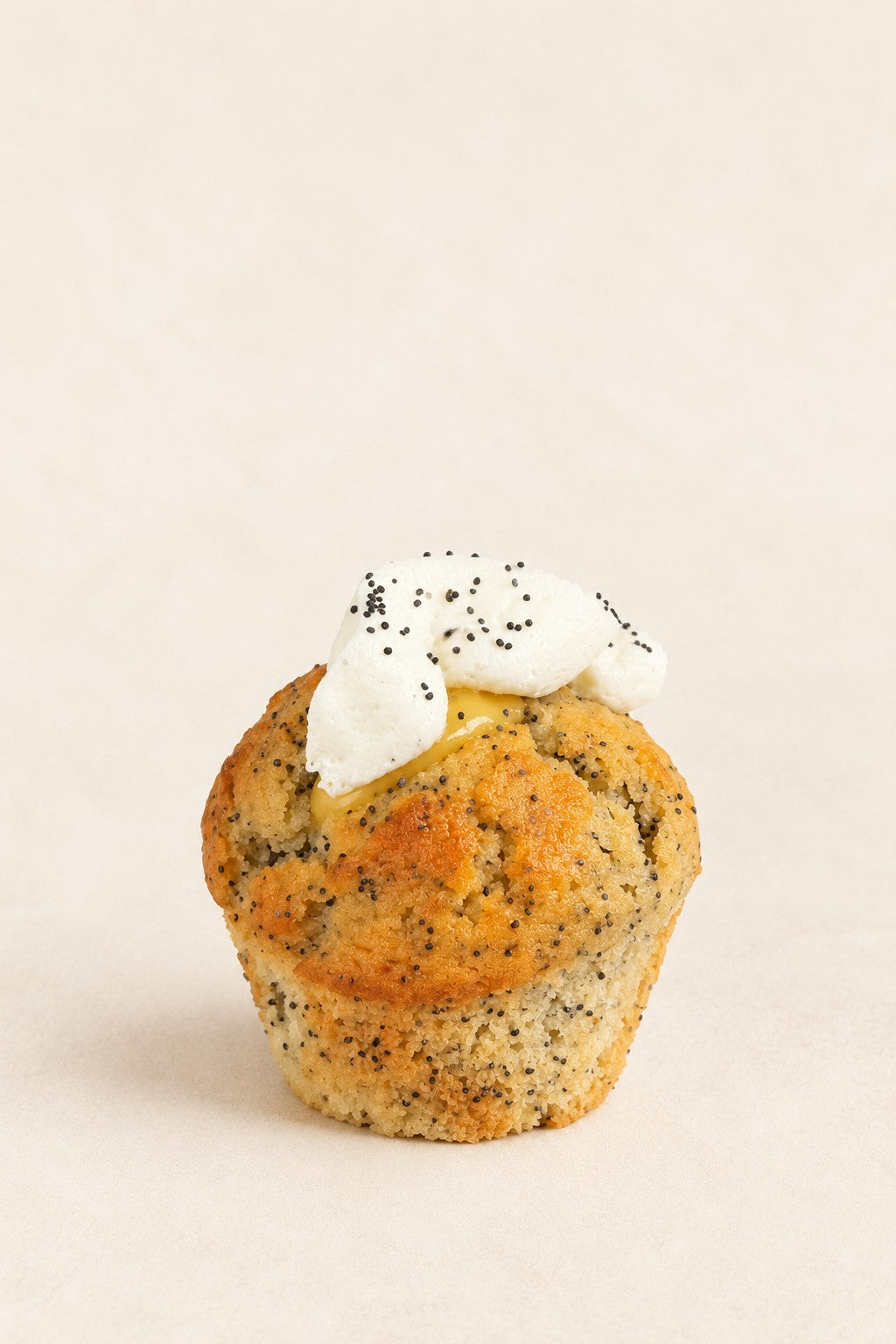Lemon - Poppy Seed - Yuzu Muffin by Batida - lemon muffin with yuzu curd and mascarpone cream cheese frosting, sprinkled with poppy seeds