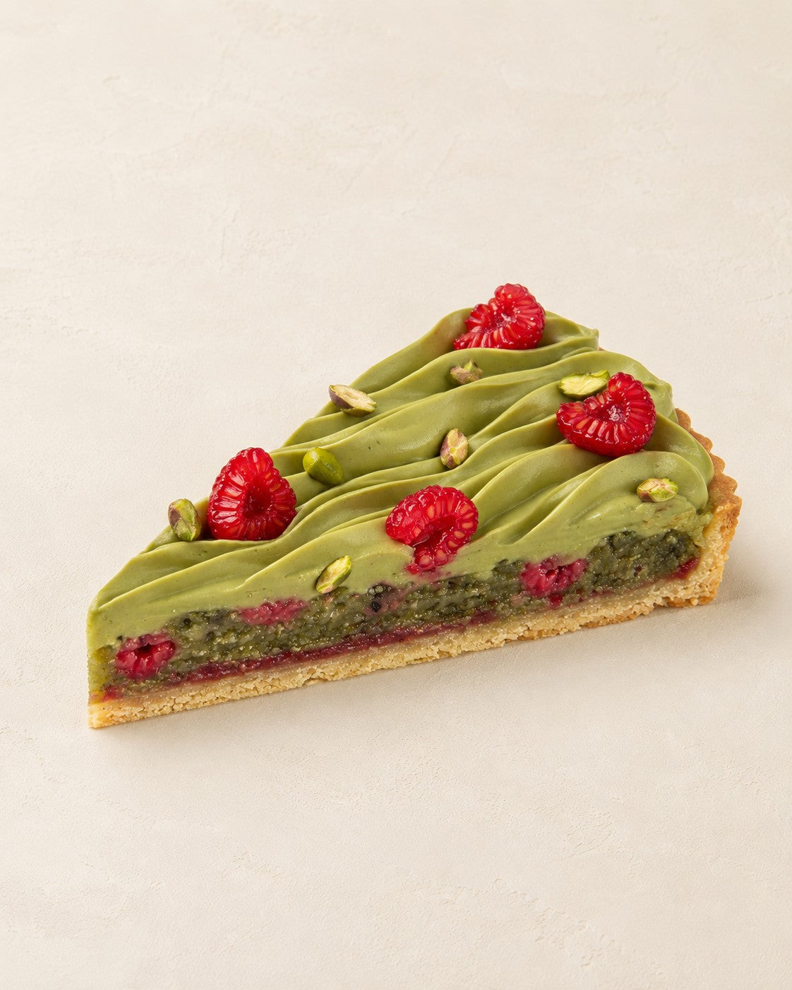 Tarta pistacjowa frangipane z malinami Batida - przekrój