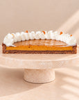 Pumpkin tart in cross-section - pumpkin filling on a chocolate base