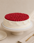 Gâteau Vintage de Batida - gâteau aux framboises avec décor de crème style vintage