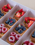Batida fruit tartlets with hand-arranged fruit, set of 12 pieces, close-up