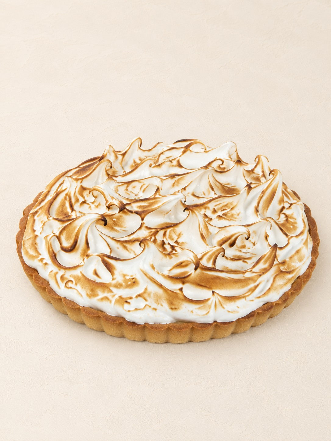 Tarta cytryna - yuzu z opalaną bezą Batida - migdałowe kruche ciasto, lemon curd z yuzu i opalana beza szwajcarska