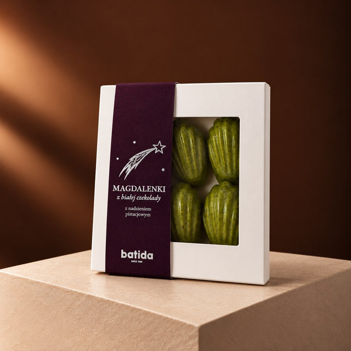 Madeleines aus weißer Schokolade mit Pistazie