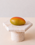 Mango individual dessert by Batida - yuzu cream with a mango insert and coconut crunch under a white chocolate shell