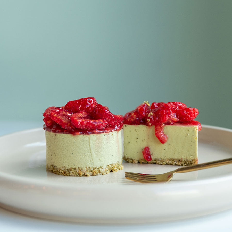 Matcha cheesecake with raspberries