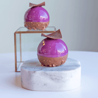 Cinnamon mousse with plum