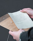Write your letter by Batida - elegant letter-style card on natural paper, close-up
