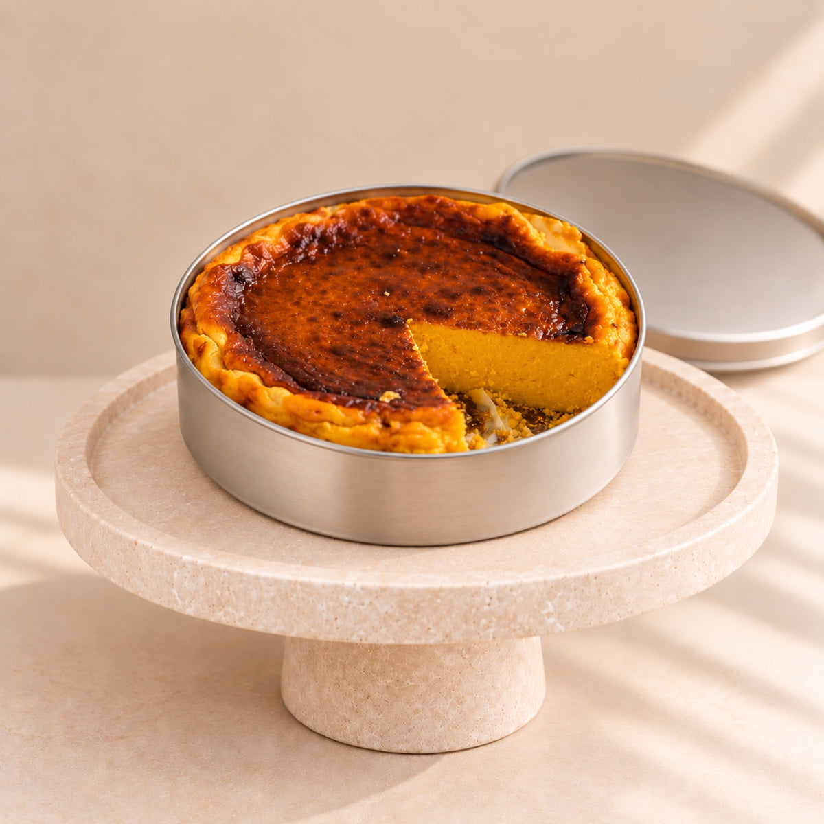 Pumpkin cheesecake in a can with a browned top, side view