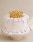 Golden Crown Torte von Batida - Torte mit Creme-Rüschen und Schleife