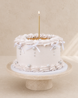 Golden Crown Torte von Batida - Torte mit Creme-Rüschen und Schleife