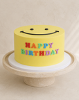 Gâteau Sourire de Batida - gâteau d'anniversaire jaune avec un smiley